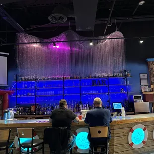 enjoy a drink at the wild bar