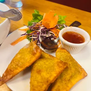 a plate of food and a bowl of soup