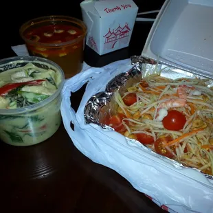 Green curry, tom yum soup, and papaya salad