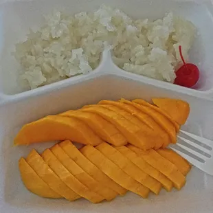 Mango with sticky rice to-go (few pieces already eaten!)