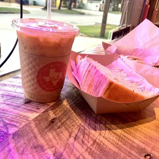 Iced Latte with a slice of iced Lemmon Cake...