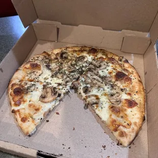 White pizza with mushrooms. Forgot to take a picture before I took a slice!