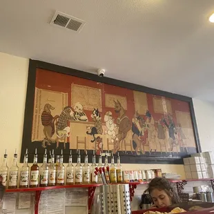 a woman sitting at the counter