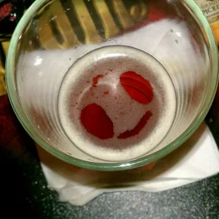 Smiling beer at red dog.