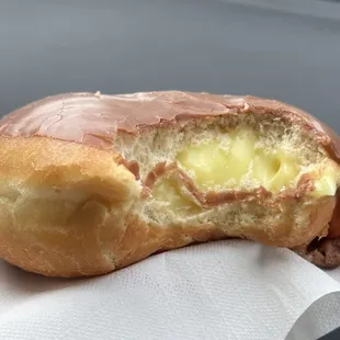 Chocolate glazed Bismark with custard