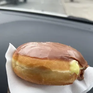 Chocolate glazed Bismark with custard