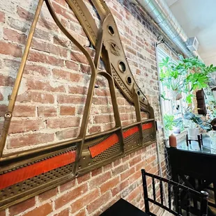 a brick wall with a clock on it