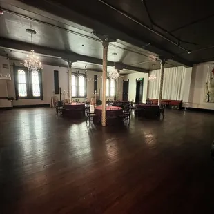empty dining room with chandeliers