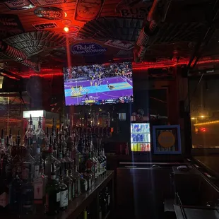 a bar with a lot of bottles
