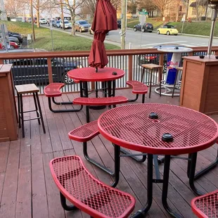 tables and umbrellas on a deck