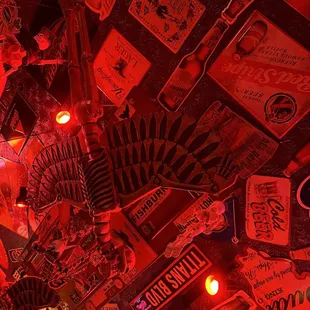 a ceiling full of beer signs