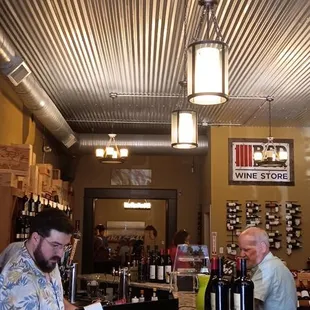 two men at a counter