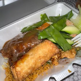 Egg roll, fried rice, shrimp with sno pea, and pork egg foo young