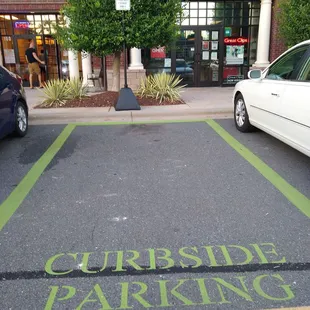Oh, they&apos;re fancy with curbside on the ground a curbside official road sign 07.26.2020