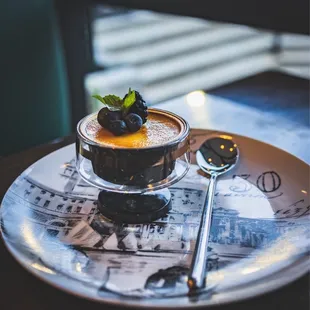 a dessert on a plate with a spoon