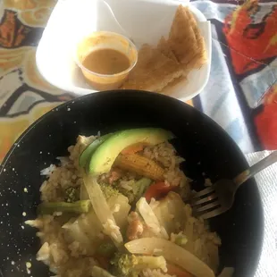 Massaman curry with tofu and roti with peanut sauce! I got it to goReally nice people and wonderful flavorful dishes!