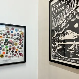 a black and white poster with buttons on it