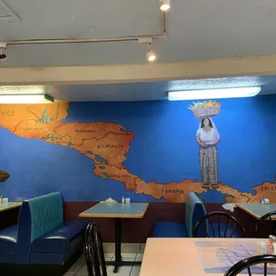 a woman standing in a restaurant