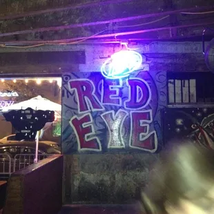 a blurry image of a neon sign