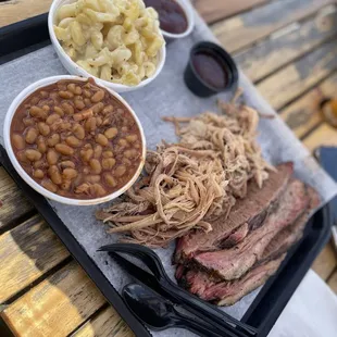 Brisket pulled pork baked beans and macaroni and cheese