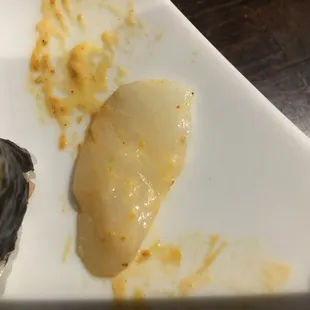 This is what they call seared scallops. Google images of seared scallops and tell me if these look good. They're raw!