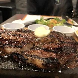 Steak served on a hot stone slab