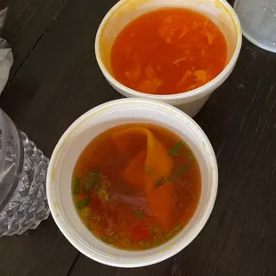 Neon orange wonton soup and egg drop soup