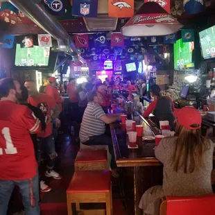 people sitting at the bar