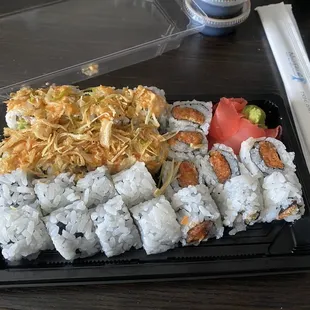 CLOCKWISE: Spicy Crunch California Roll, Spicy Salmon Roll &amp; Philadelphia Roll