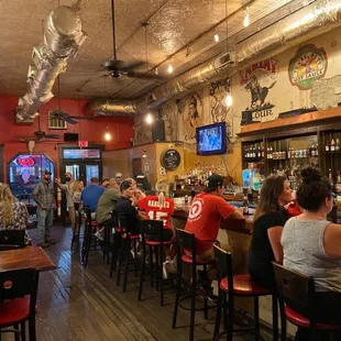 people sitting at the bar