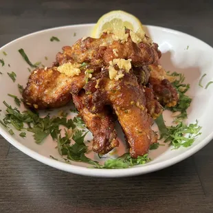 a plate of fried wings