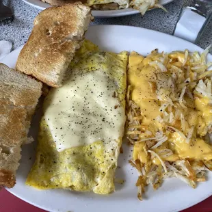 Build your own omelette, hashbrowns with onion and cheese. Homemade white bread.