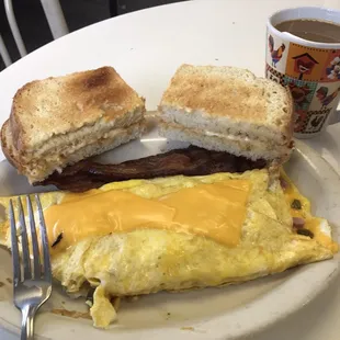 Here's a picture of my omelette. Sorry I took a bite before taking the picture. Seem everyone takes pics of there omelettes. Enjoy.