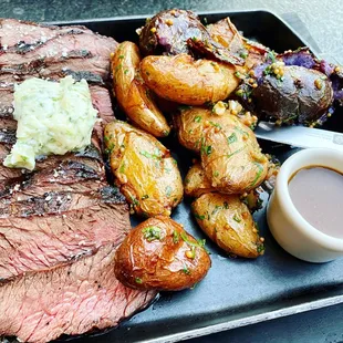 steak, potatoes, and sauce