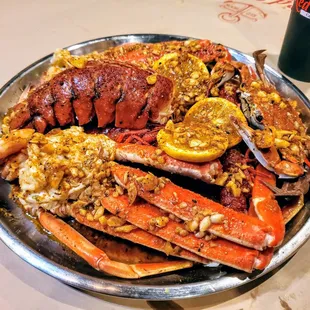 a plate of crab legs and crab legs