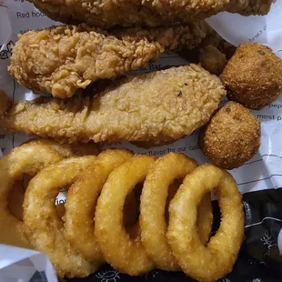 Catfish was tasty. Onion rings were good .