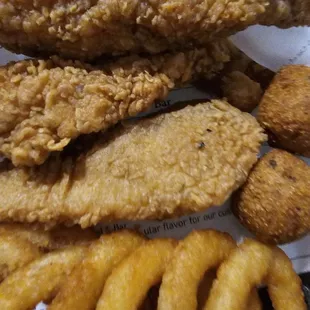 Catfish was crispy, onion rings good, and Hush puppies were free and tasted good.