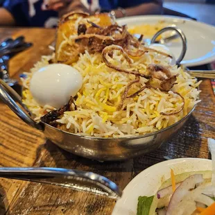 Chicken Briyani ... only bone in...bowl is kinda needs to be wider difficult to scoop the rice without it falling on the table.