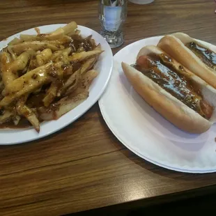 Chili and cheese fries with chili and cheese dogs