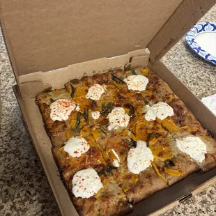 Veggie pizza: Onion Cream, Sage, Roasted honey Nut Squash, Goat Cheese &amp; Chili Flakes.