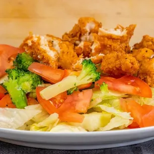 Crispy Chicken Salad $7.99 Fresh garden salad topped with crispy fried or grilled chicken.