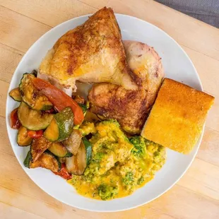 Baked Chicken Dinner $10.49 1/2 chicken + 2 sides