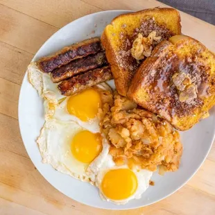 Frech Toast $8.49 eggs + breakfast meat + homefries