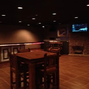a bar with a television in the background