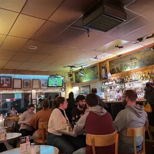 people sitting at the bar