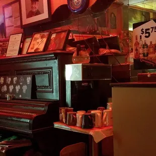 Piano with ATM next to.