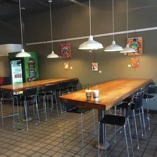 tables and chairs in a coffee shop