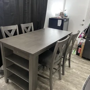 Caitbrook Table and Caitbrook bar chairs