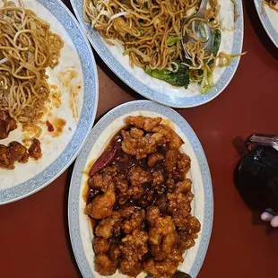 Spring rolls, orange chicken, veggie chow mean and 3 flavored Kungpao Yummy!