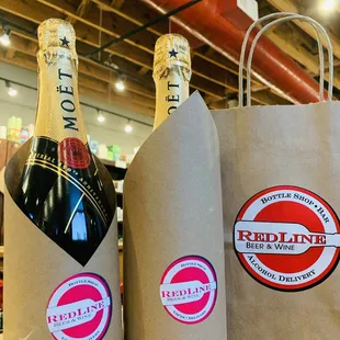 three bottles of red line